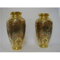 A PAIR OF BRASS BALUSTER VASES, damascened copper and white metal, Arabic script, height 34cm (2)...