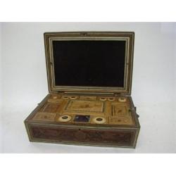 AN INDIAN HARDWOOD WORK CASKET, c.1840-1860, sarcophagus shape, bone and micromosaic inlay, fitte...