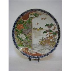 A CIRCULAR JAPANESE PLAQUE, late 19th Century, enamel decorated view of exotic birds on a riversi...