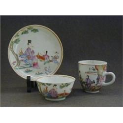 A QUIANLONG COFFEE CAN SAUCER, and matching tea bowl, 19th Century, polychrome figure decoration,...