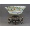 Image 1 : A FAMILLE VERTE DECORATED BOWL, extensive island scene and calligraphic verse, square seal mark,...