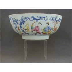 A QUIANLONG PUNCH BOWL, famille rose figures in a blue rococo cartouche border, diameter 26cm, (r...