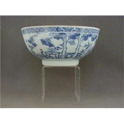 A CHINESE EXPORT PUNCH BOWL, underglaze blue designs of peonies and bamboo, diameter 22cm, (resto...