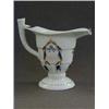 Image 1 : A HELMET SHAPED PITCHER, Chinese armorial export, c.1800, the design a heater shaped shield under...