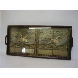 A BULLION WORK TEXTILE PANEL, possibly late 19th Century, from a robe, ho ho birds in flight on a...