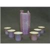 Image 1 : A SAKI SET, 20th Century, pink lustre with white spots, six cups and pot (7)  20-30...