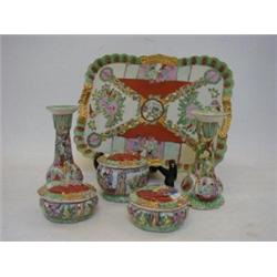 A DRESSING TABLE SET, of recent manufacture, pair of candlesticks, three cosmetic jars, tray, wid...