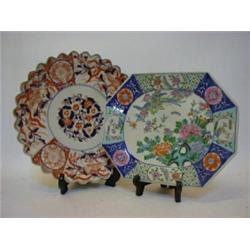 A CIRCULAR PLAQUE, late 19th Century, freely painted foliage in the Imari palette, diameter 30cm...