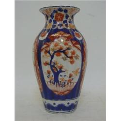 AN IMARI BALUSTER VASE, freely decorated prunus branches, height 23cm  30-50...