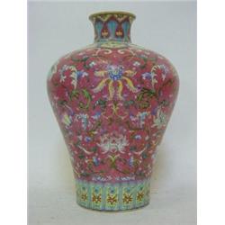 A MEIPING BOTTLE VASE, famille rose incised background overall pattern of arabesque and flowers,...