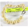 Image 1 : #6-SEA SHELL PEARL BRACELET 7.5" LIGHT YELLOW