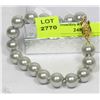 Image 1 : #10- SEA SHELL PEARL BRACELET 7.5" GREY