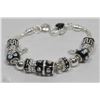 Image 1 : PANDORA STYLE BRACELET W/ BLACK AND SILVER CHARMS