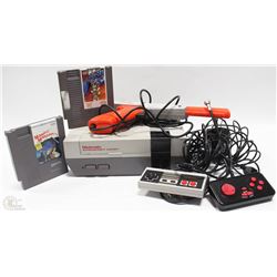 ORIGINAL NINTENDO WITH ALL CORDS AND 2 GAMES