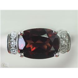 #32-STERLING SILVER GARNET RING SIZE 7.5