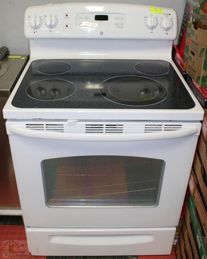 GE 4 BURNER GLASSTOP STOVE, SELF CLEANING