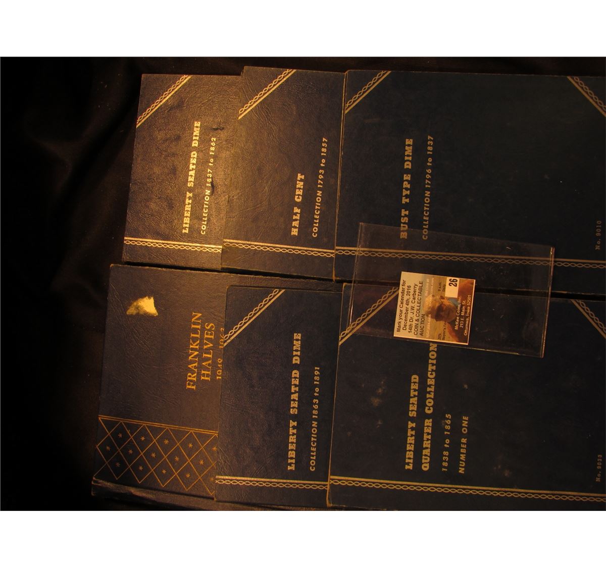 Used Whitman coin folders including "Liberty Seated Dime Collection