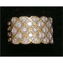 DIAMOND RING, Set with twenty-three round cut diamonds weighing approximately 1.00 carat. Mount...