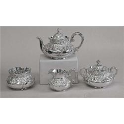 FOUR PIECE STERLING SILVER TEA SERVICE, American. Date mark for 1946. Maker: Theodore B. Starr...