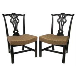 PAIR OF GEORGE III STYLE CARVED MAHOGANY SIDE CHAIRS, English. 20th Century. Each shaped top ra...