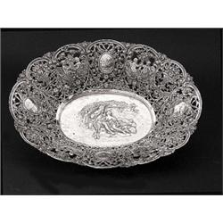 CONTINENTAL SILVER BOWL, German. Circa 1920. (.800 Fine) Centered by figures in a landscape enc...