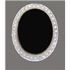 Image 1 : BLACK ONYX AND DIAMOND RING, Centered by a 25 by 18.2 mm cabochon onyx, surrounded by thirty-ei...