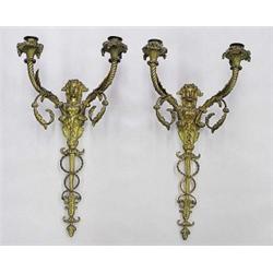 GOOD PAIR OF GILT BRONZE FIGURAL TWO LIGHT WALL SCONCES, French. 19th Century. Stamped HM95. Ea...