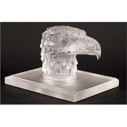 LALIQUE MOLDED AND FROSTED CRYSTAL "TETE D'AIGLE" BOOKEND, French. Signed Lalique France. Catal...