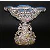 Image 1 : GOOD OLD PARIS PORCELAIN CENTERPIECE, French. 19th Century. The oval reticulated bowl encrusted...