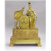 Image 1 : FINE EMPIRE GILT BRONZE MANTEL CLOCK, French. Circa 1800. The circular dial centered by a mask...