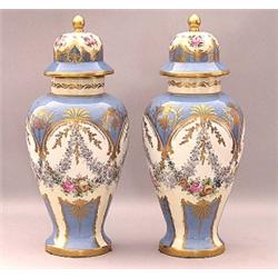 PAIR OF "SEVRES" PORCELAIN VASES AND COVERS, French. Late 19th Century. Each of baluster form d...