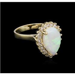 14KT Yellow Gold 1.00ct Opal and Diamond Ring
