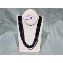MULTI STRAND BEAD NECKLACE
