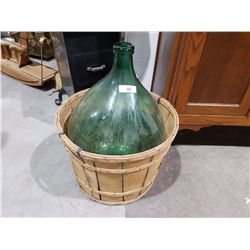 VINTAGE CARBUOY IN BASKET