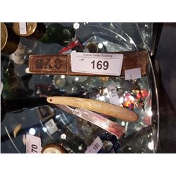 STRAIGHT RAZOR W/CARVED ANIMAL HANDLE
