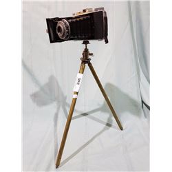 VINTAGE CAMERA ON TRIPOD