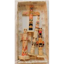 4 Old Eskimo Totem Poles