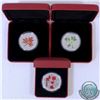Image 1 : RCM Lot: 2001, 2003 and 2004 Canada $5 Coloured 1oz .9999 Fine Silver Maple Leaves (TAX Exempt). Coi