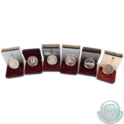 RCM Lot: 1980, 1984, 1986, 1987, 1988 & 1989 Canada Cased Commemorative dollar issued by the RCM. So