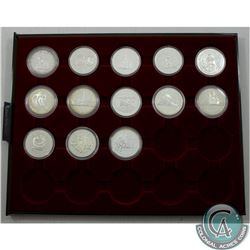 RCM Lot of 13x 1973-1997 Canada Proof Commemorative Silver Dollars in Blue Numis Tray. The dates you