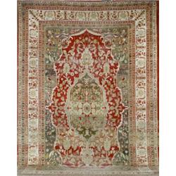 Oushak Rug, Circa 1920, Shaded blue ground within a floral trellising vine field centering a...