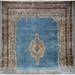 Kerman Rug, Post 1950, Pastel blue ground centering a pulled medallion on rose-green ground w...