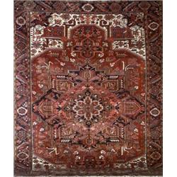 Heriz Rug, Post 1950, Red ground with herati field centering a star medallion on red ground,...