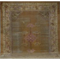 Agra Rug, Second Quarter 20th Century, Gold ground centering joined floral medallions within...