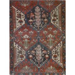 Baktiari Rug, Post 1950, Variegated ground enclosing diagonal octagonal medallions enclosing...