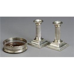 Pair of English Weighted Silver Candlesticks and a Wine Coaster, The candlesticks, Goldsmiths a...