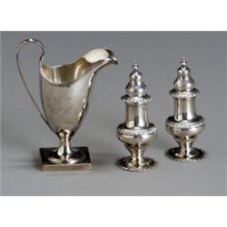 George III Silver Creamer and a Pair of Edwardian Casters, The helmet-form creamer, Thomas Olli...