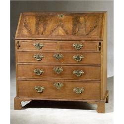 George III Style Walnut Slant-Front Bureau, 19th Century, The interior fitted with a central...