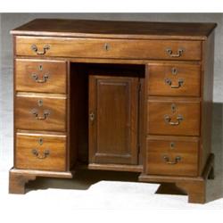 George III Mahogany Kneehole Writing Desk, Last Quarter 18th Century, The center drawer fitte...