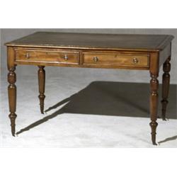 Victorian Gilt-Tooled Leather Inset Elmwood Writing Table, Circa 1840-1850, Some abrasions to...